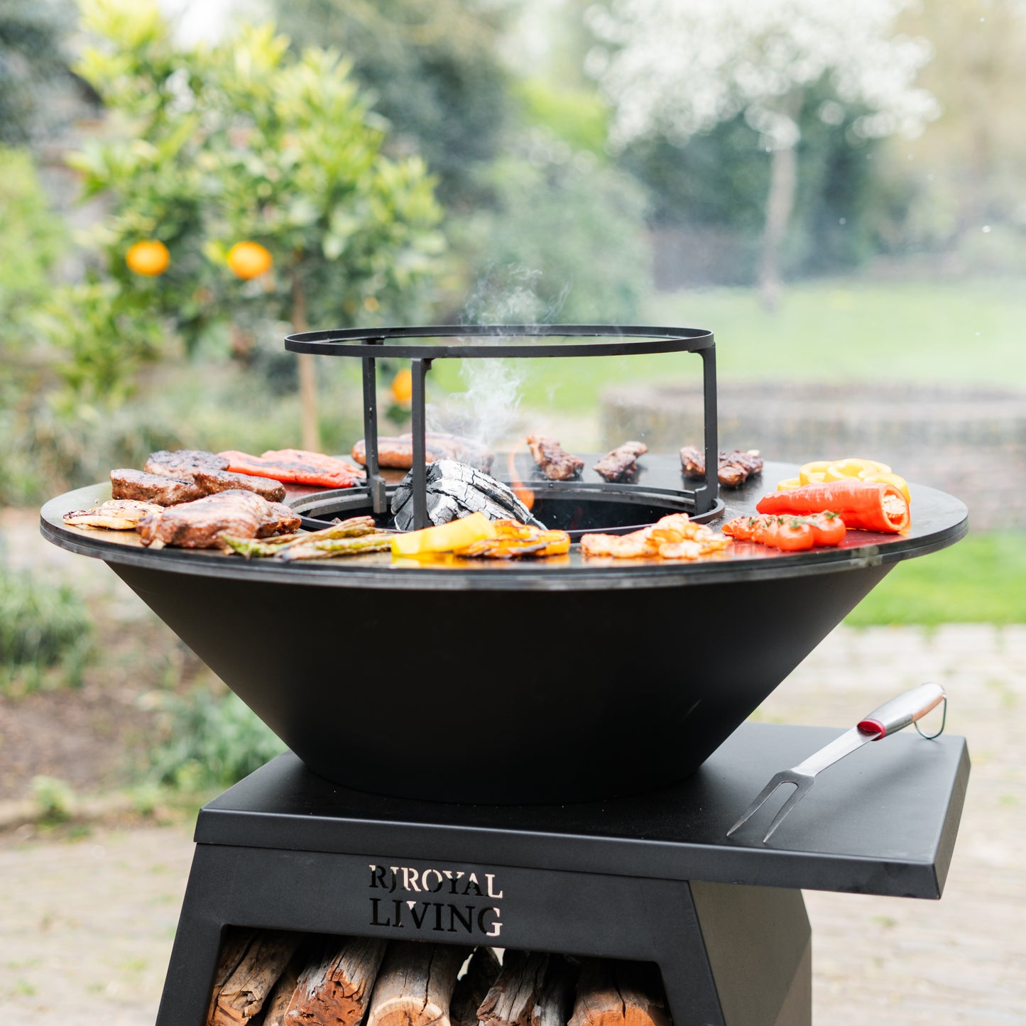 BBQ Plancha Grill Compañero XXL Blackline - With poker and wood storage Ø80cm