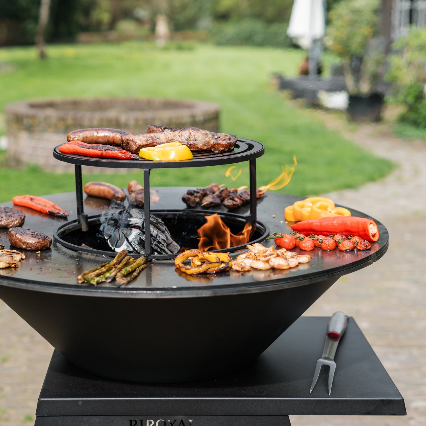 BBQ Plancha Grill Compañero XXL Blackline - With poker and wood storage Ø80cm
