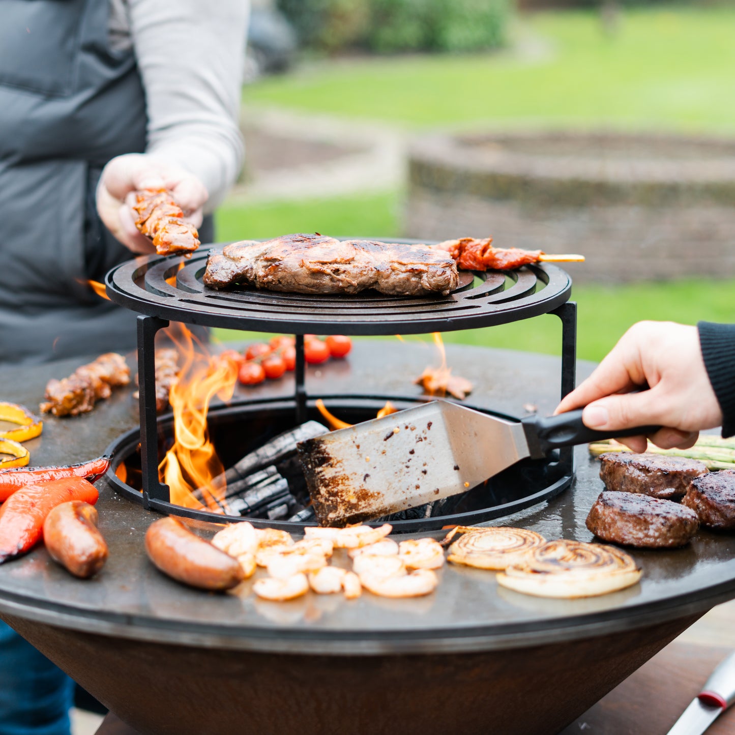 BBQ Plancha Grill Compañero XXL Corten steel - With poker and wood storage Ø80cm