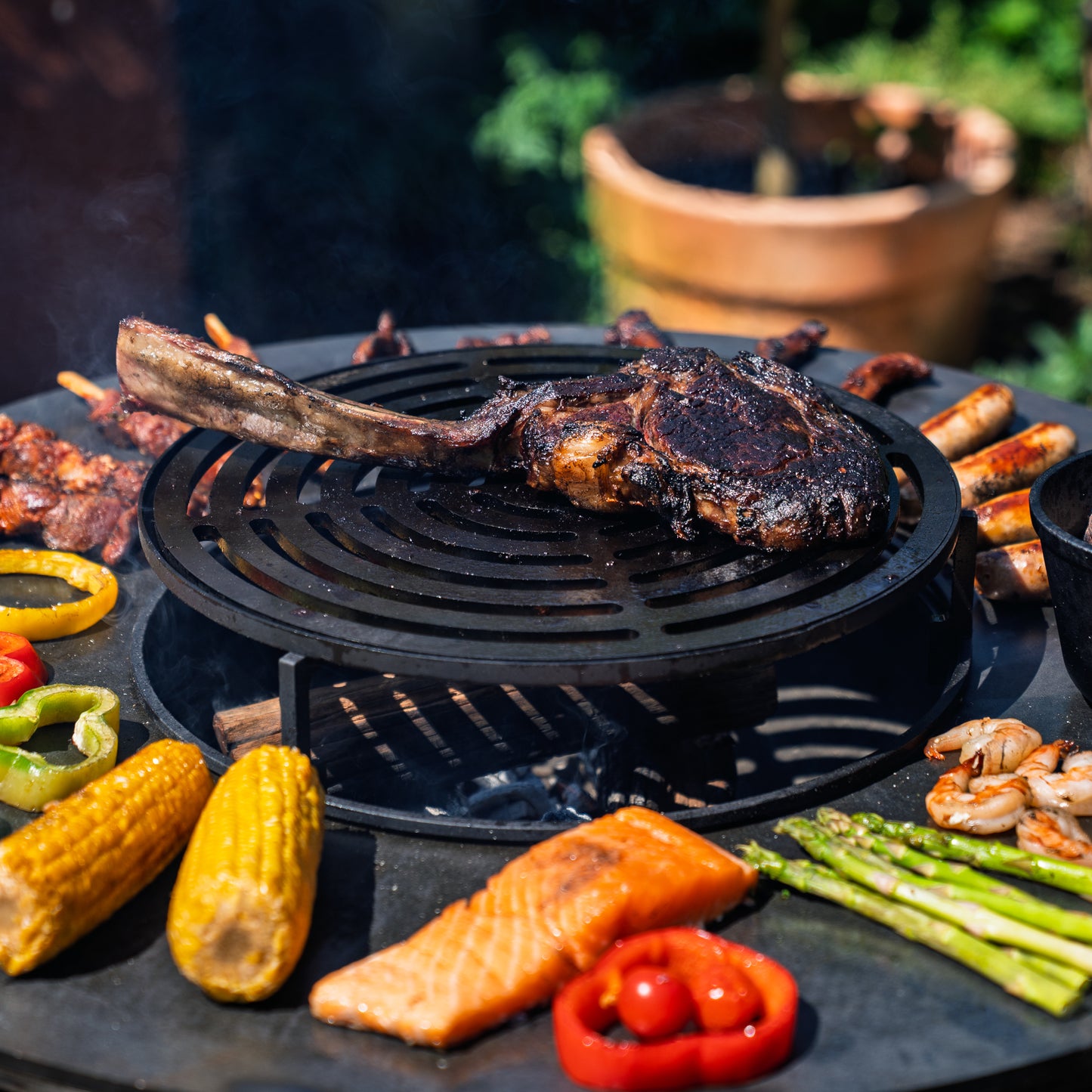 BBQ Plancha Grill Hermano XXL Blackline Corten steel - With poker and wood storage Ø80cm 8mm