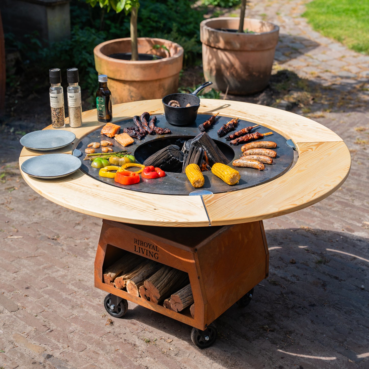 BBQ Plancha Grill Brasero Corten steel fire pit with Cooking plate Ø80cm and Mesa (wooden ring) large wheels, wood storage
