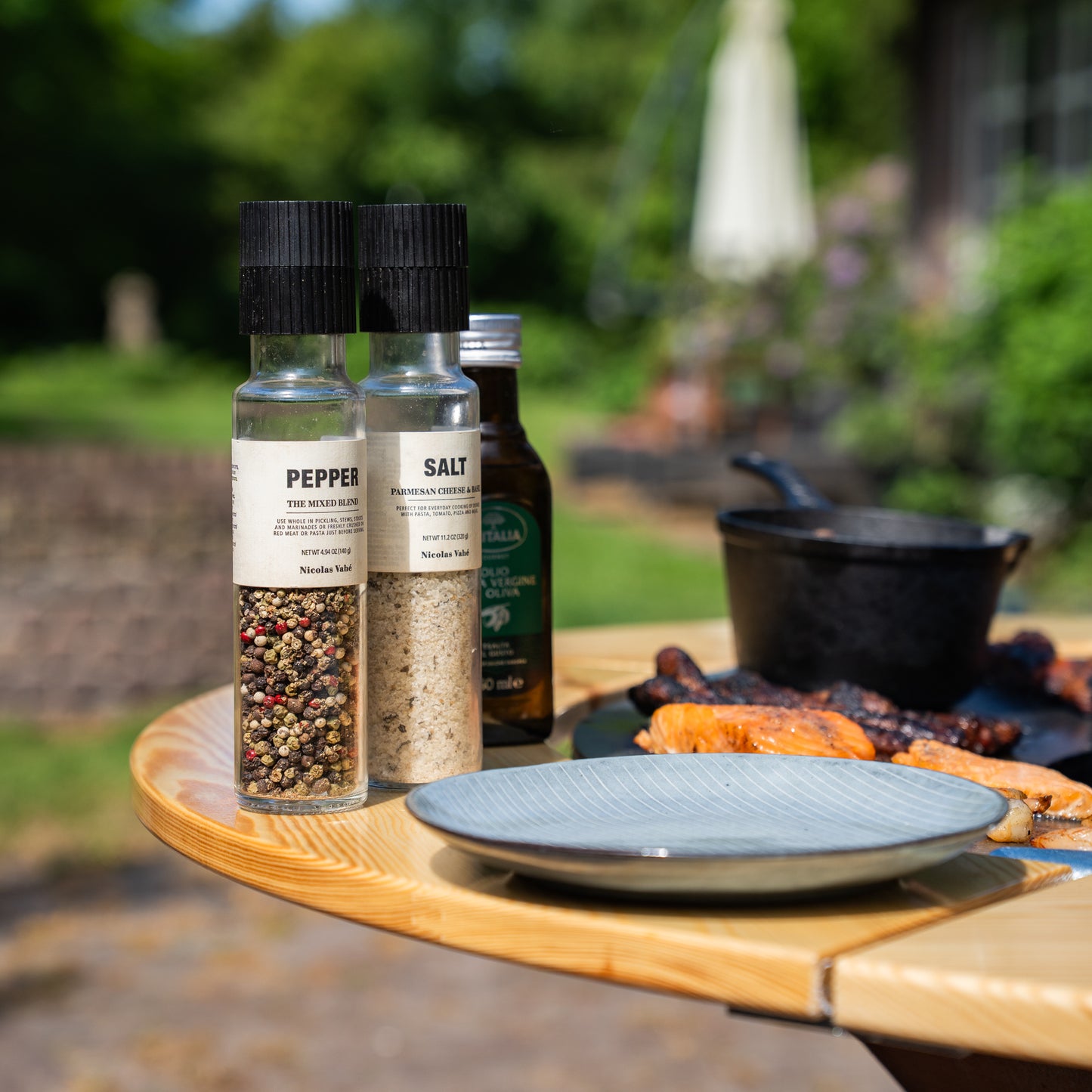 BBQ Plancha Grill Brasero Corten steel fire pit with Cooking plate Ø80cm and Mesa (wooden ring) large wheels, wood storage