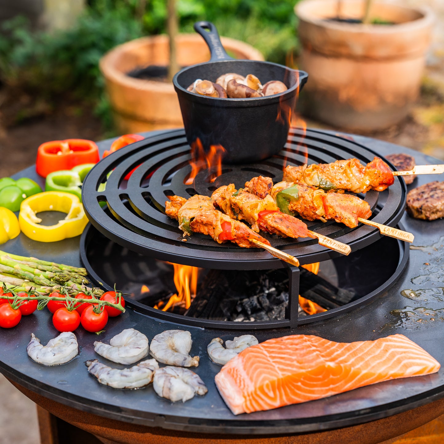 BBQ Plancha Grill Corten steel 8mm Camarada 2.0 - With poker and wood storage Ø70cm
