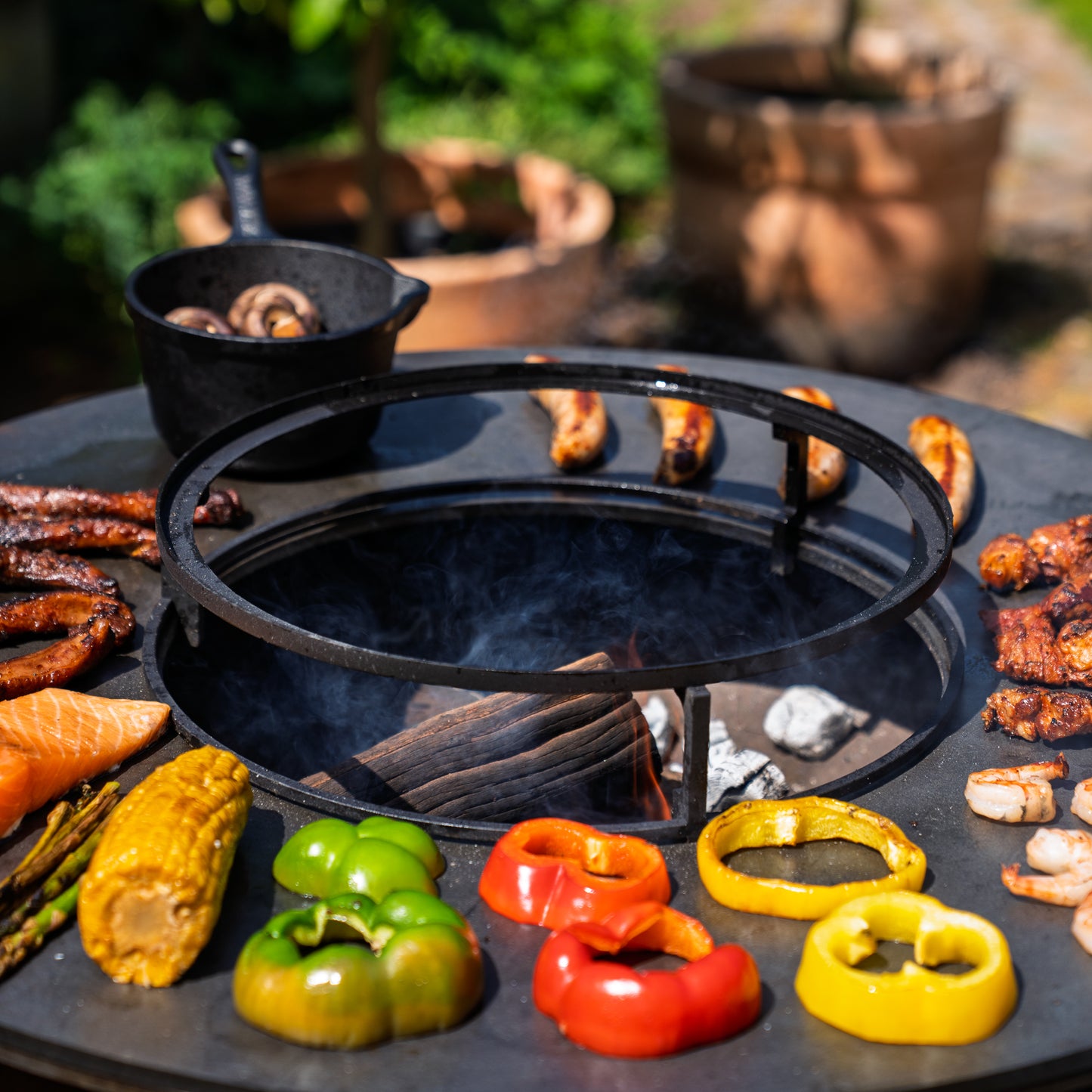 BBQ Plancha Grill Hermano XXL Corten steel Blackline - With poker and wood storage Ø80cm 8mm