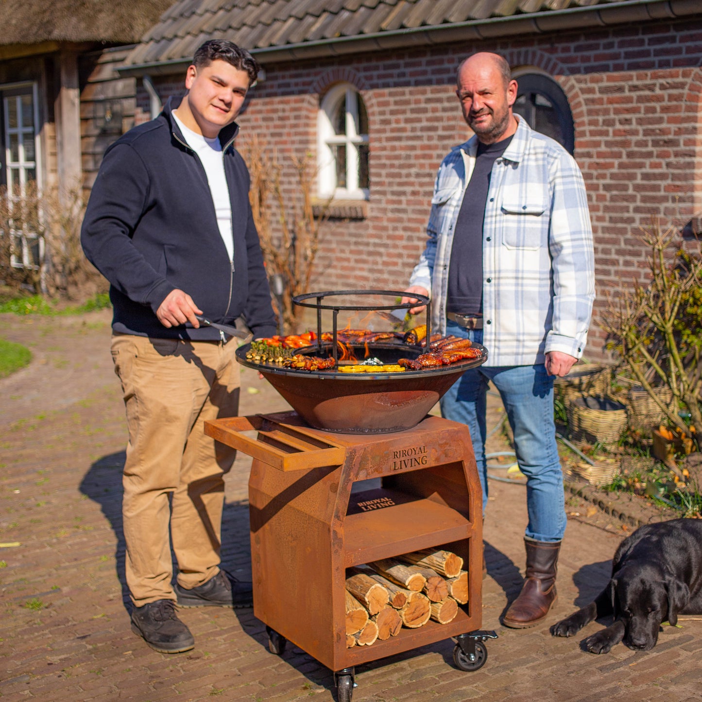BBQ Plancha Grill Maestro Ø70cm Corten steel - With large wheels and wood storage