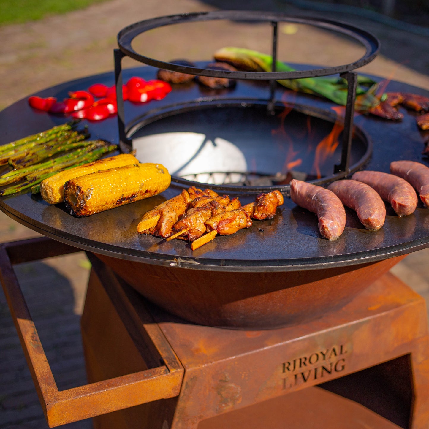 BBQ Plancha Grill Maestro XXL Ø80cm Corten steel - With poker and wood storage