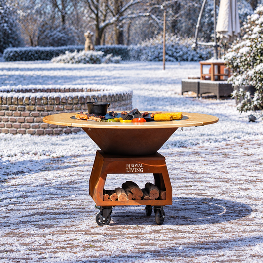 BBQ Plancha Grill Brasero Corten steel fire pit with Cooking plate Ø80cm and Mesa (wooden ring) large wheels, wood storage — winter setting